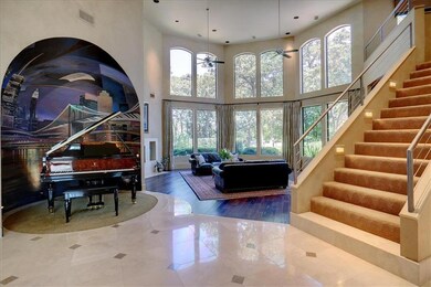 Impressive front entry with hand painted mural.