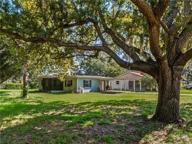 Second view of home showing large corner lot
