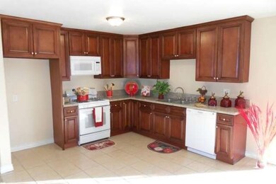 Brand new kitchen with tile floor