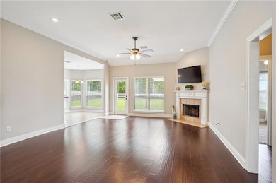 Large living room with 10' ceilings, fireplace ope