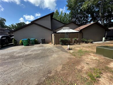View of property exterior featuring a cooling unit