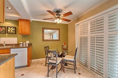 Cozy breakfast nook that opens to sunny and inviting patio.