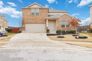 Traditional-style house featuring brick siding, a