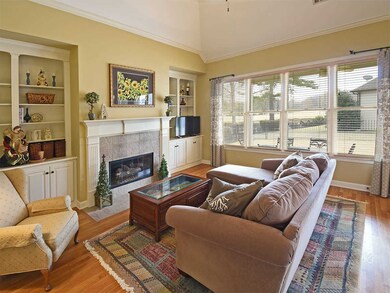 There are views of the golf course across the back