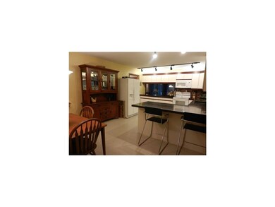 Kitchen. There is a breakfast bar area, an eat in 