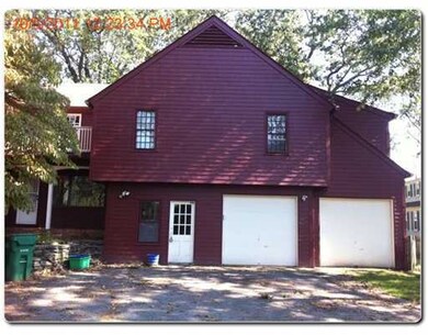 Exterior Front. RIGHT SIDE OF THE HOUSE AND DRIVEW