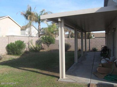 Covered Patio and backyard