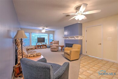 Spacious family room with large windows