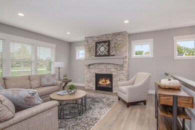 Living Room with Stone Fireplace