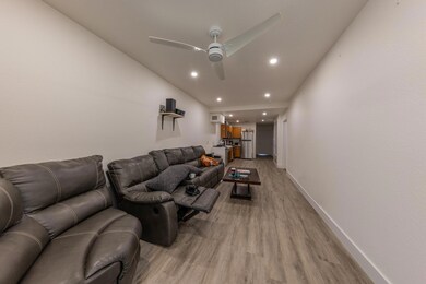 Living area featuring light wood finished floors,