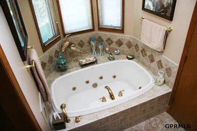 Custom tile & whirlpool.