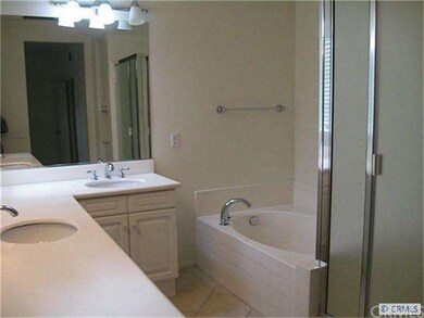 Master Bath has roman tub and separate shower