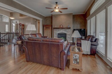 Stone fireplace and extensive upgraded trim throug