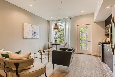 Living area with light wood finished floors, rece