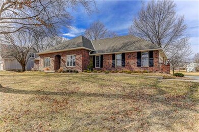 All brick story and a half on estate size lot in b