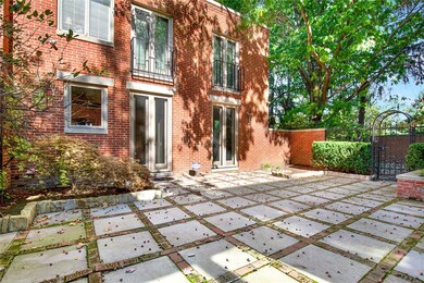 The patio also features a gated access to a side y