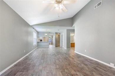 View of the dining area with updated tile floors,