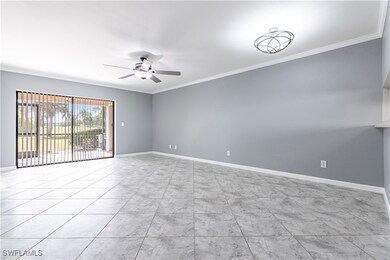 Unfurnished room with baseboards, ceiling fan, and