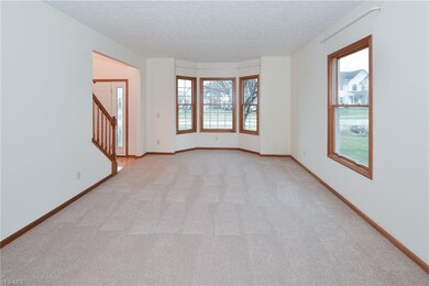 Formal Living Room With New Carpeting.