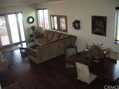 The open Living and Dining rooms tht lead to the f