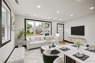 Living room featuring recessed lighting, baseboard