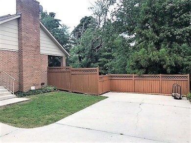 Side Entry Garage with Privacy Fence