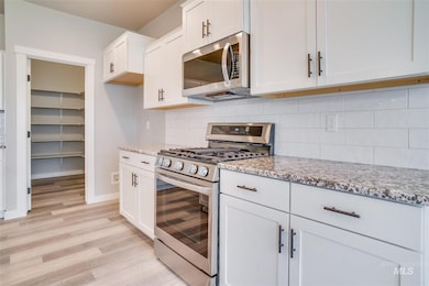 8588 E Drover Loop, Nampa, ID 83687 - photo 4