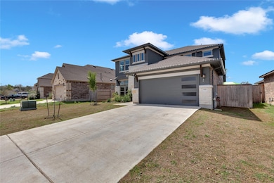 View of front of property with driveway, stucco s