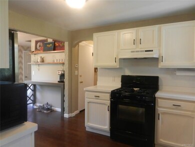 kitchen connects to formal dining room