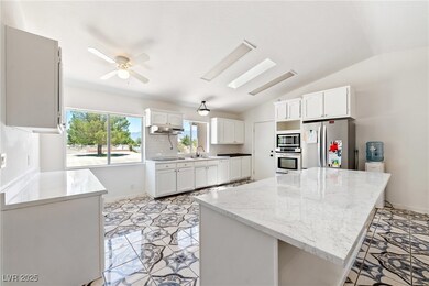 Kitchen featuring appliances with stainless steel