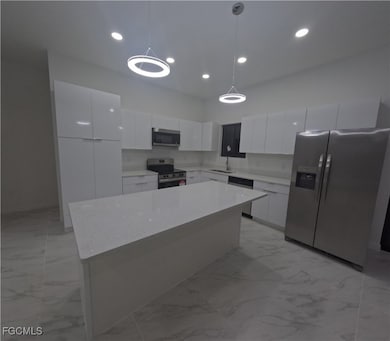 2227 NW 3rd Ave, Cape Coral, FL 33993 - photo 4