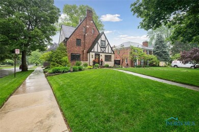 Beautiful brick tudor on a corner lot in Old Orcha