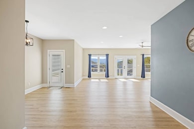 view from kitchen into dining/great room