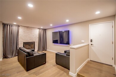 Living area with light wood finished floors, a fir