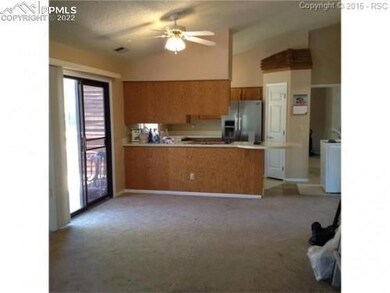 dining to kitchen with deck door on left