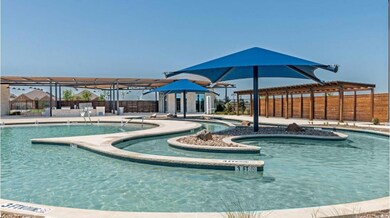 View of pool featuring a pergola and a patio area