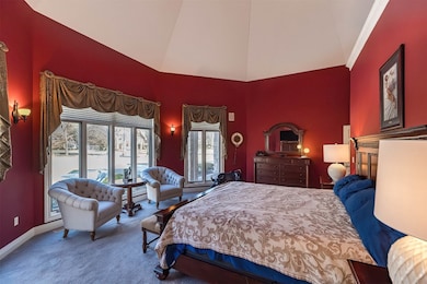 First floor primary bedroom serves as a private oa