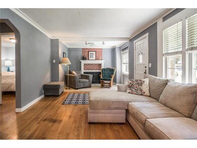 Follow the curved pathway to the front door and en