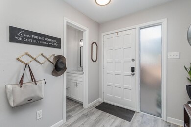 Foyer featuring light hardwood / wood-style floori