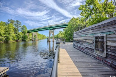 Dock featuring a water view