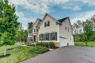 Front Right Elevation with 2-car Garage and Paved 
