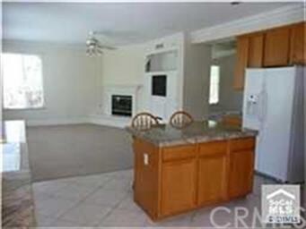 Looking from the kitchen nook to the center island