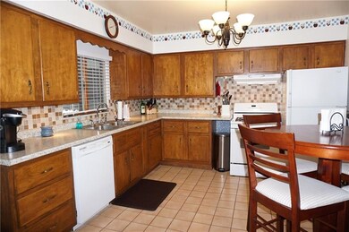 Another view of the fully equipped kitchen with al