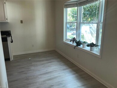Breakfast area with beautiful window letting in all the light.