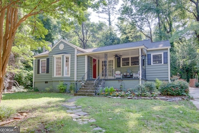 Mature trees create shade in the front yard