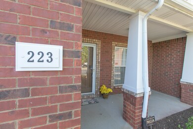 Welcome Home! Sit in the shade of your covered front porch and chat with the neighbors!