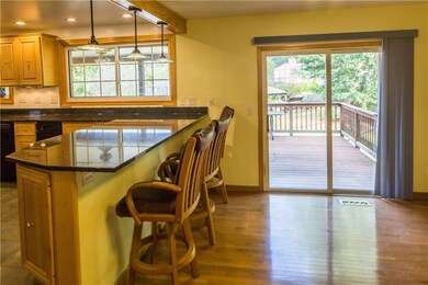 Access to the large covered deck and fenced in bac