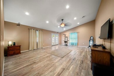Living room featuring light wood-type flooring, va