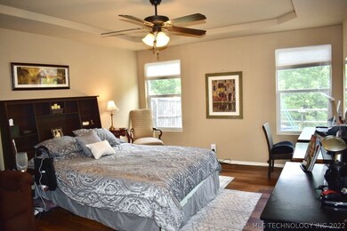 The Spacious Master Bedroom overlooks the backyard