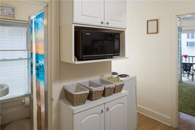 Kitchen storage with a microwave